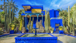 Le Jardin Majorelle, amazing tropical garden in Marrakech. Le Jardin Majorelle, amazing tropical garden with Arabic style architecture illuminated by sunset light in Marrakech, Morocco