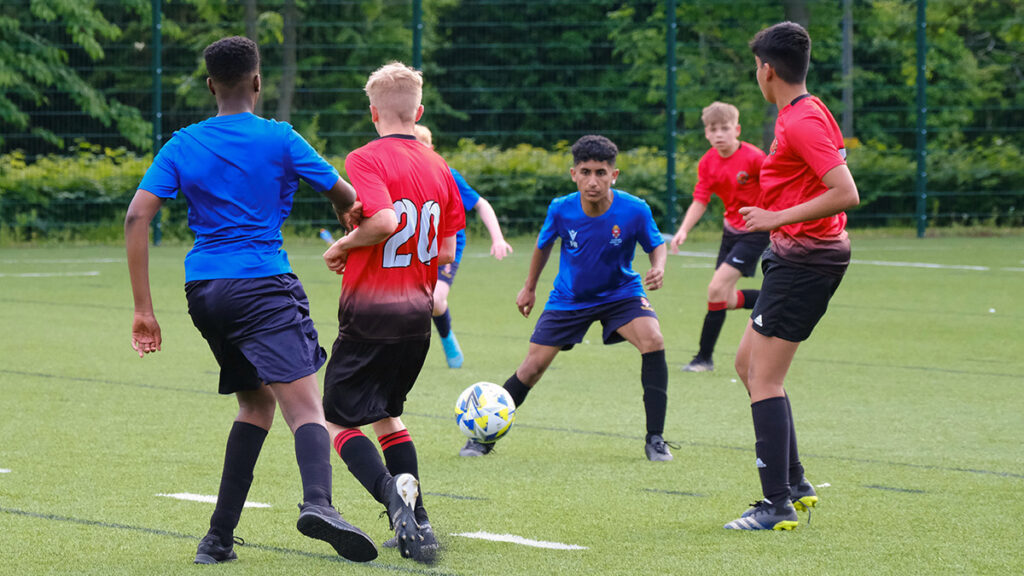 Two football teams battling it out at Derby Uni in the Midlands UK