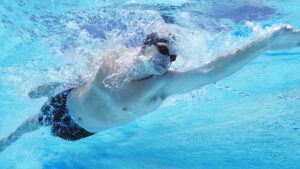 Man swimming competitively