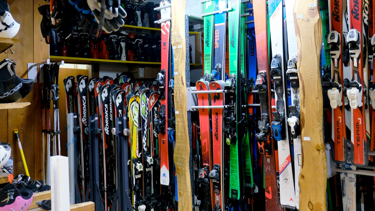 Racks of colourful skis hung on the wall