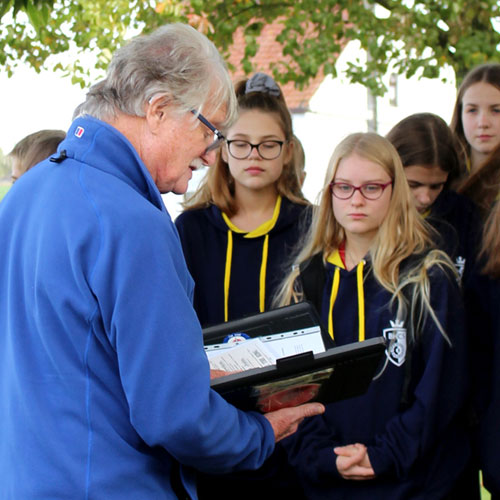 A History Tour Guide educates students on an educational tour.