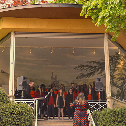 Choir singing on a bandstand