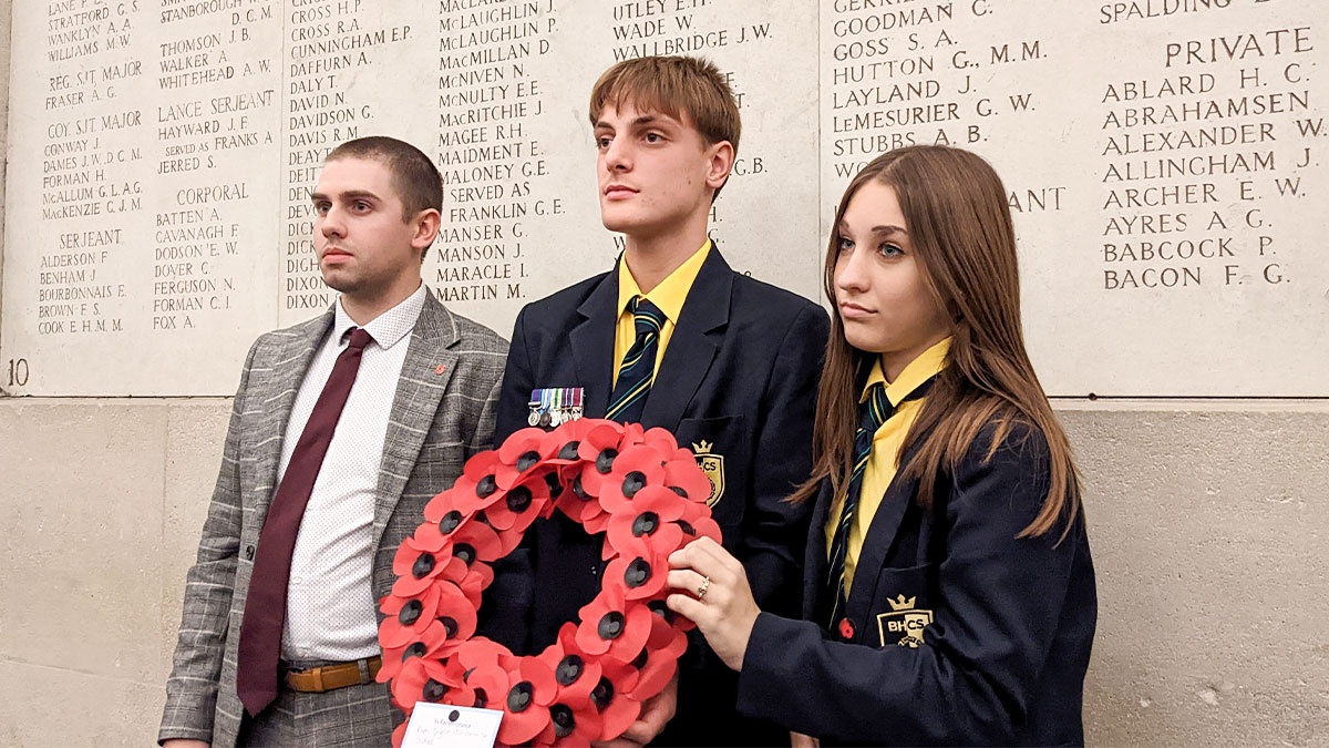 School pupils laying a poppy wreath at the Menin Gate Ypres